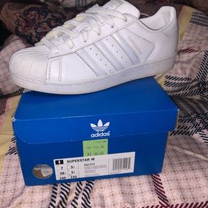 Fairly new all white girls Adidas shoes